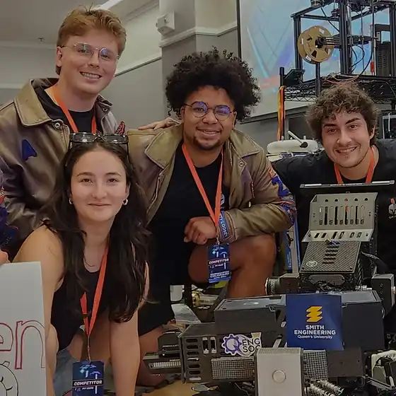Queen's Knights members sharing robotics with the community
